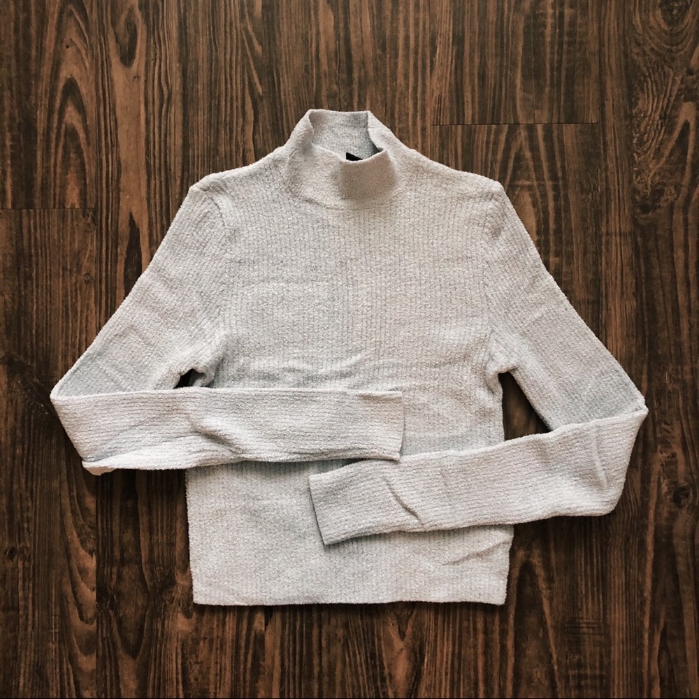 cropped gray mock-neck sweater